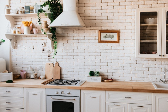 kitchen with brick backsplash