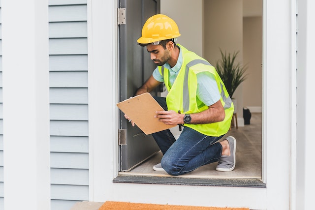 man doing home inspection